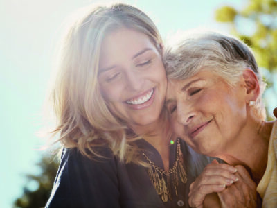 Shot of a happy senior woman spending quality time with her daughter outdoors